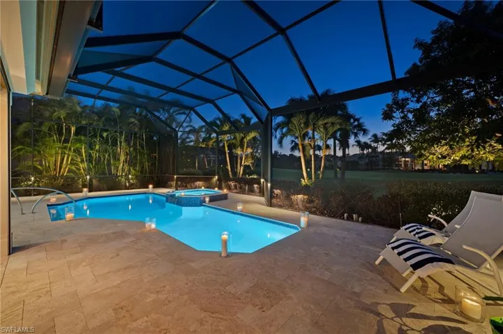 In the evenings, this home takes on a whole different vibe, as the owners thoughtfully added a custom-lit pool screen to add to the ambiance.