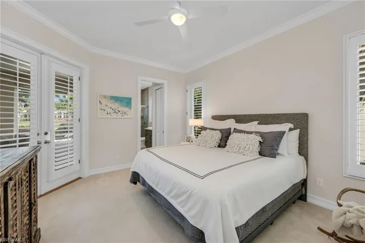 The guest suite in the back has French doors that open out to the pool and amazing views...