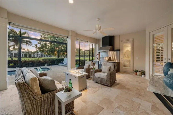 The expansive travertine deck has many covered areas for relaxing, swimming, entertaining and truly enjoying life!