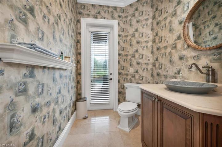 Powder bathroom. Access to Lanai.
