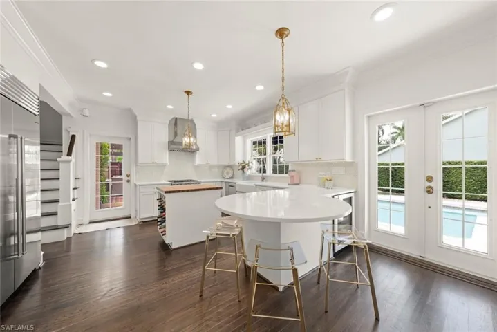 Kitchen with back staircase.
