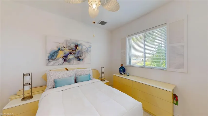 Bedroom featuring a ceiling fan
