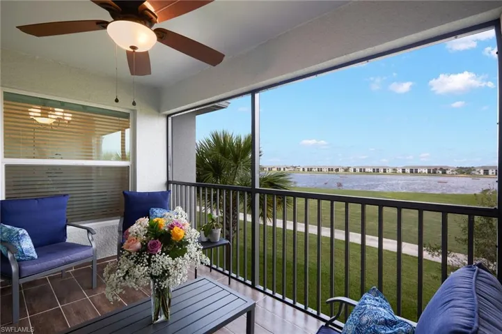 East facing, enclosed balcony with water view and fairway