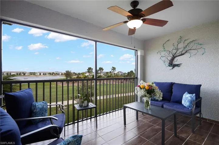 Enclosed Balcony with Sunrise Water & Fairway views!