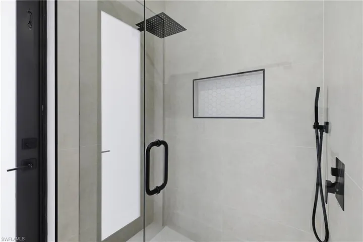 Bathroom featuring a stall shower