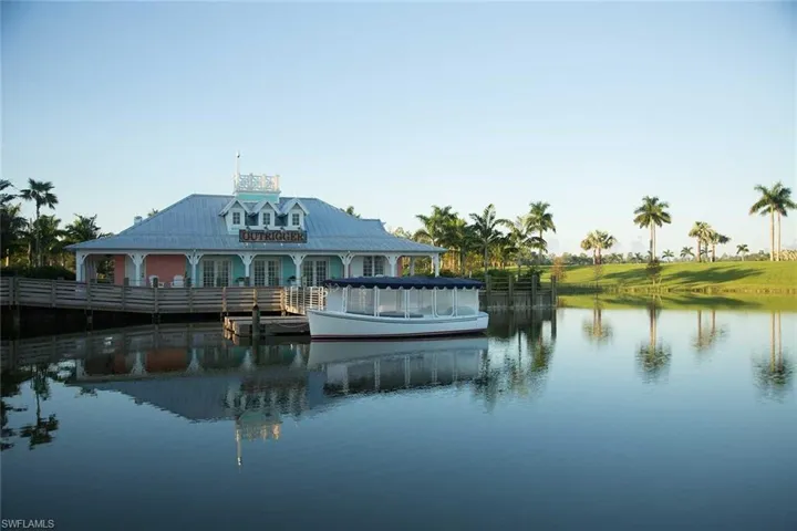 Rear view of property with a water view
