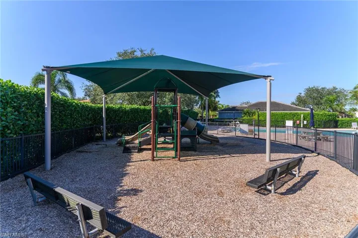 Communal playground featuring a community pool