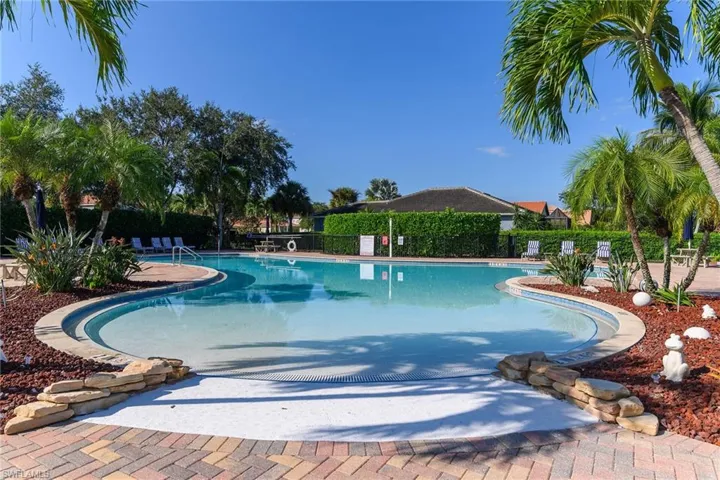 Community pool featuring a patio area