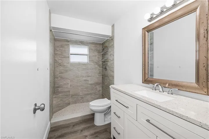 4012(R) Bathroom walk in new tile/shower, new vanity and new light LVP wood plank floors