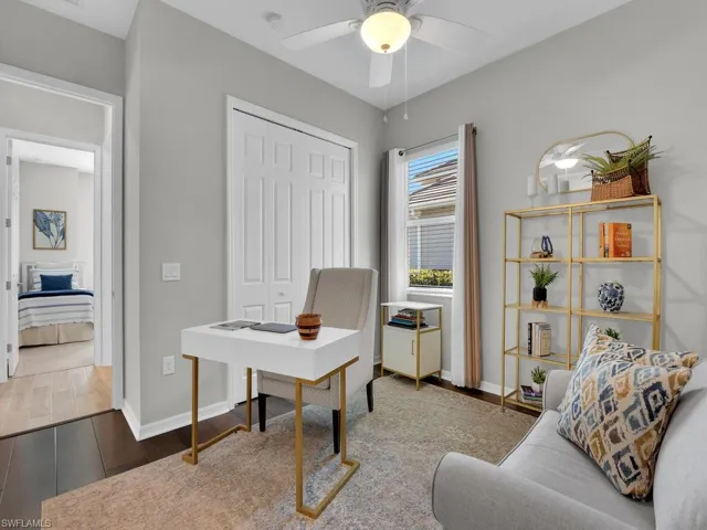 Office/Den with a twin sleeper sofa that is part of the funrniture package that conveys with the home