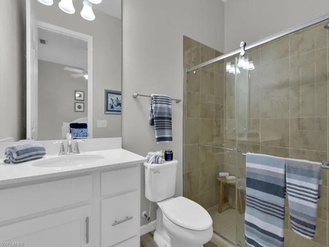Bathroom suite within bedroom #2 with Custom Glass Shower Door enclosure