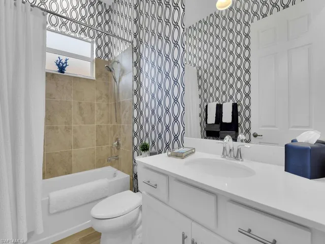 Guest bathroom #3 located between the guest bedroom #3 and the Den/office