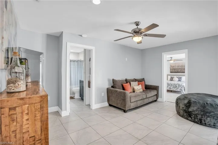 Office/den with a full bath and access to the lanai/pool area
