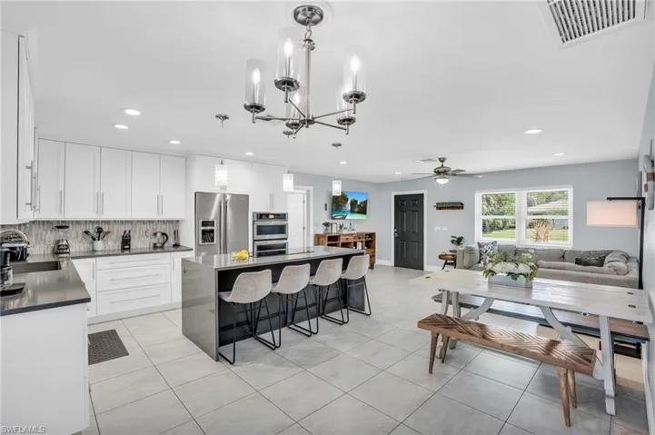 Beautifully updated kitchen with open concept living/dining! Great space to entertain!