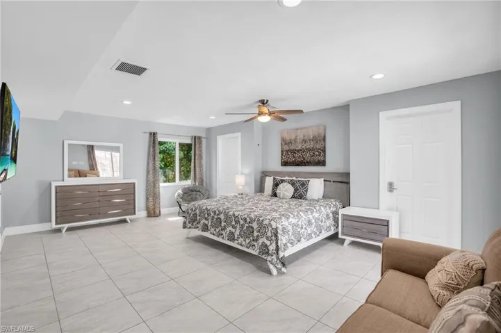 Large master en-suite with a huge walk in closet.