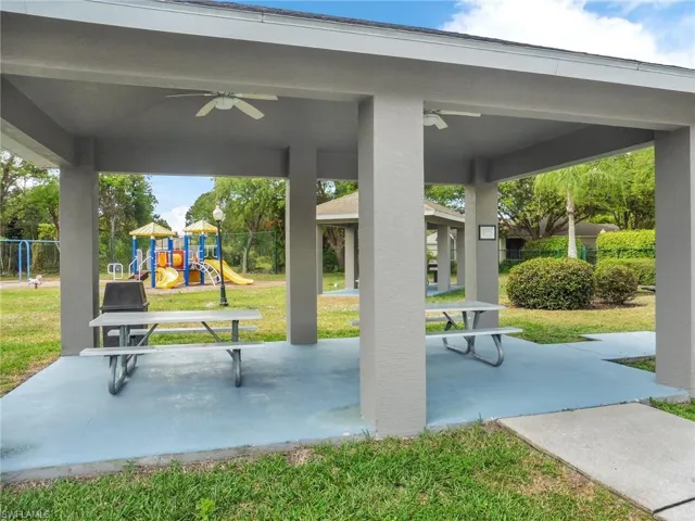 Community picnic area with grill and play area