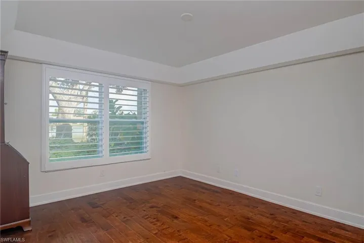 Primary bedroom with view to lake