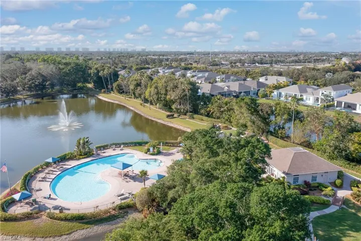 Aerial view of Clubhouse, walking trails, pool with overview to surrounding neighborhoods