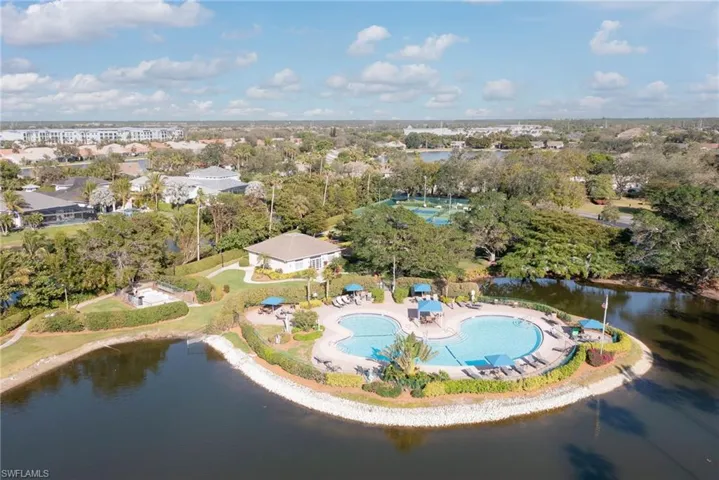 Aerial view of Clubhouse & pool; lake with fountain