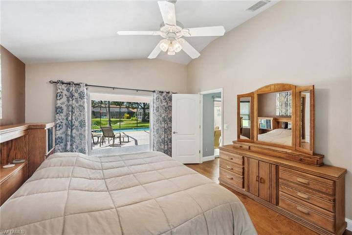 Primary bedroom with sliders to lanai!