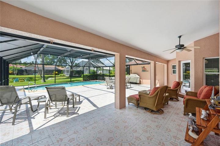 HUGE covered lanai with electric shutters!