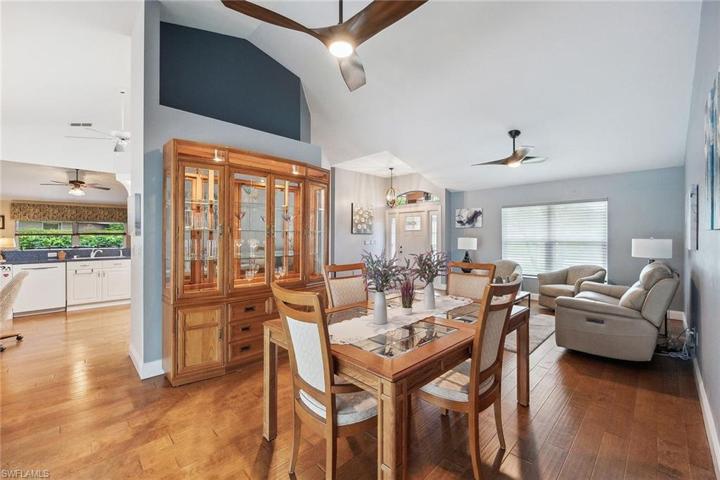 Fantastic floor plan flows from living room, dining room, and kitchen! Look at these gorgeous hardwood floors!