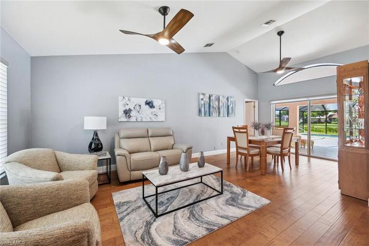 Living Room opens to Dining Room - best quality hardwood floorig throughout!