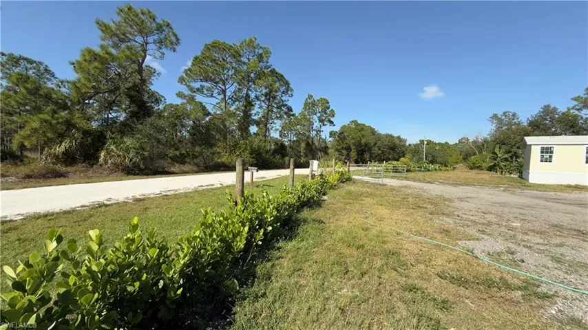 View of asphalt street featuring a rural view