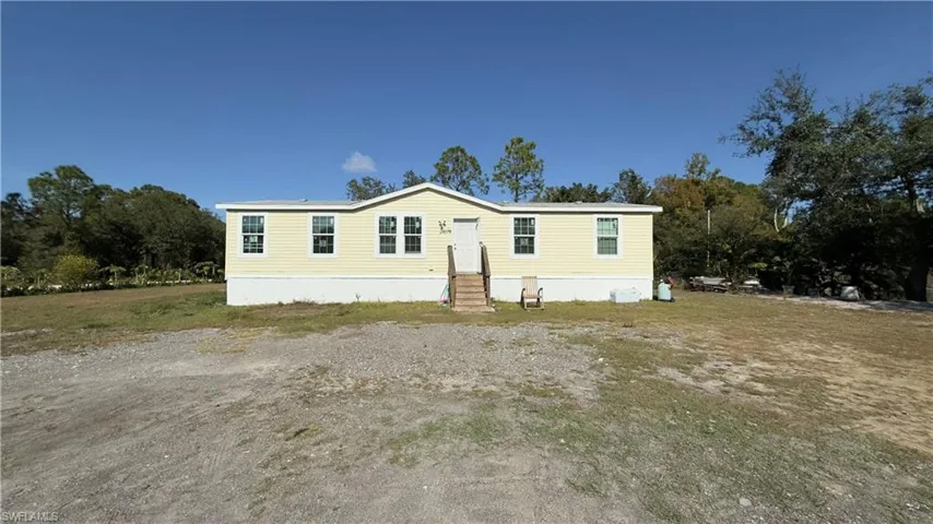 Manufactured / mobile home featuring entry steps