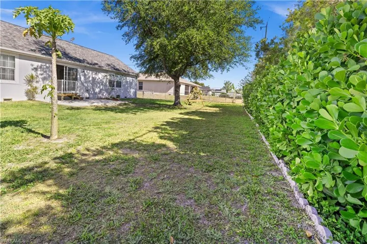 Fenced yard featuring a patio area