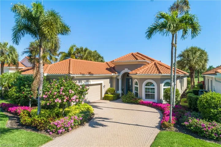 Two car oversized attached garage, arched window front elevation with interior "wagon wheel" custom plantation shutters. Quiet location away from I-75, 3 Oaks Parkway and Coconut Rd. Ten-minute walk to The Brooks Commons Club via a boardwalk overlooking a lake.