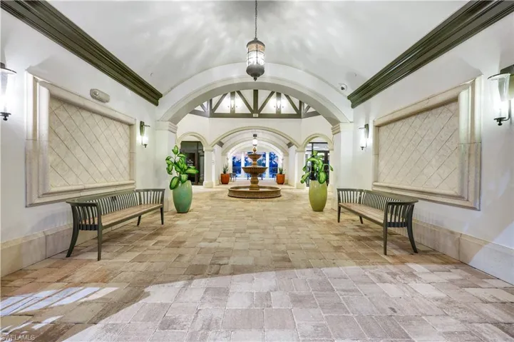 Lobby featuring a barrel ceiling and ornamental molding