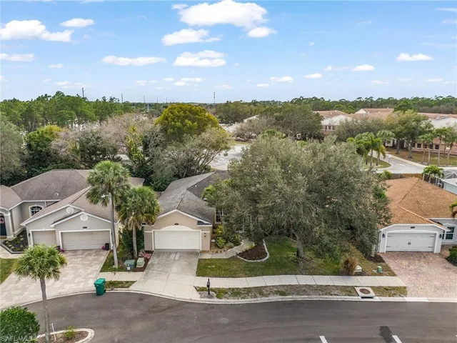 Aerial view of residential area with a tree filled landscape