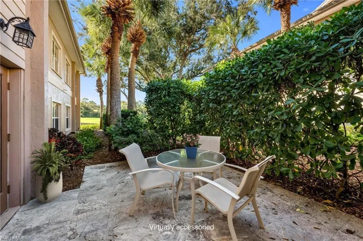 Virtually staged plant on table and pot. Very private and a great place to entertain Al Fresco!
