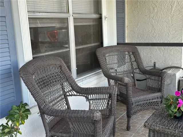 Front has a lovely patio sitting area.