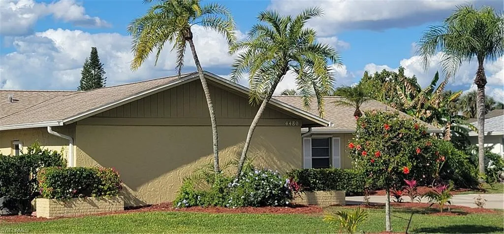 FRONT ELEVATION - NICELY SIZED FRONT, SIDE, AND REAR YARD...
