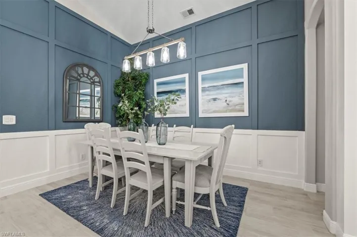 Dining space featuring light hardwood / wood-style flooring