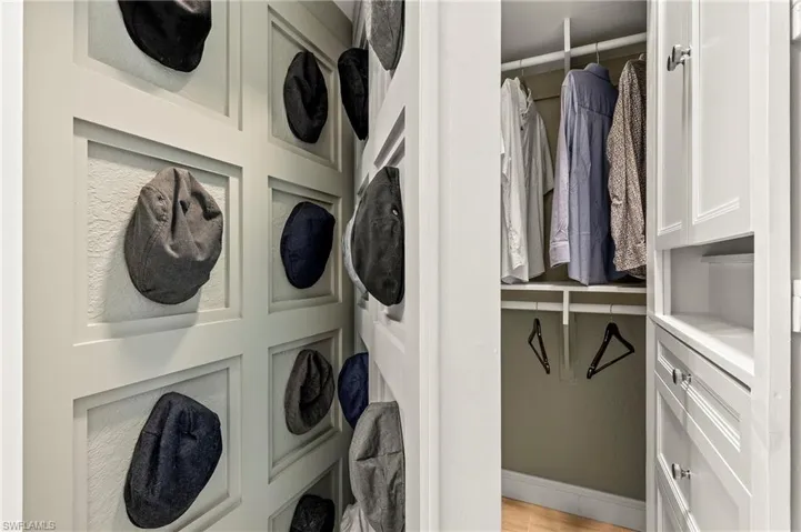 Laundry room featuring light hardwood / wood-style floors