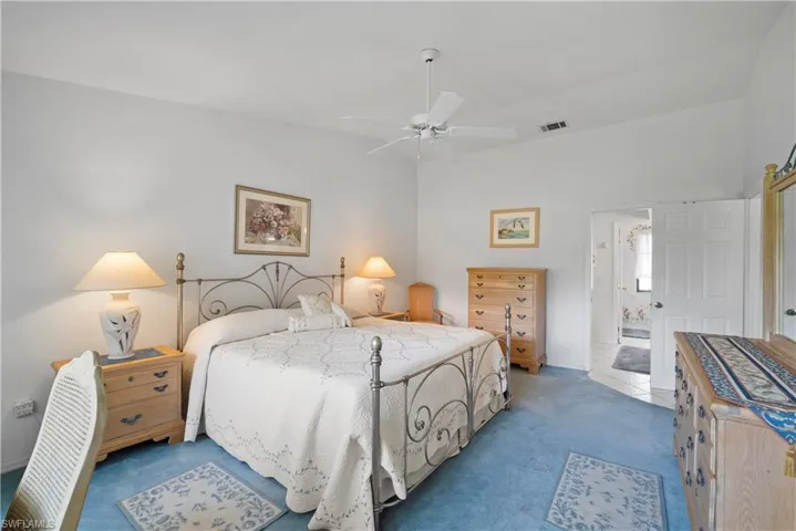 Bedroom with carpet flooring and ceiling fan