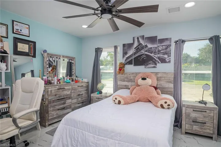 Bedroom featuring ceiling fan
