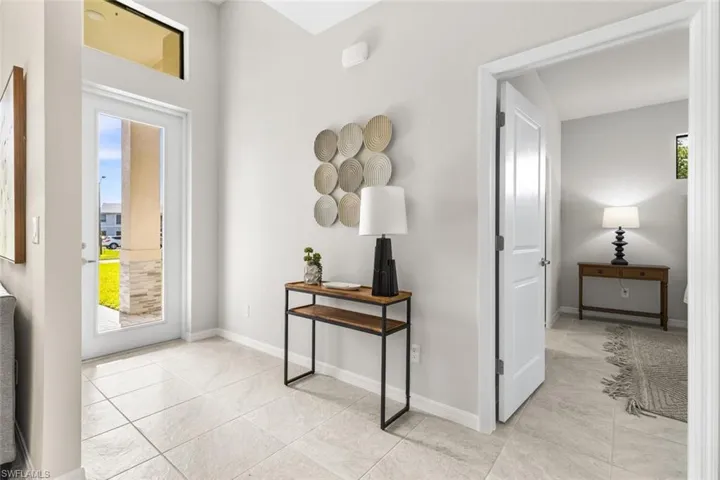 Double glass entry doors with transom window