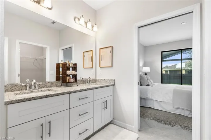 Dual sinks with granite vanity top