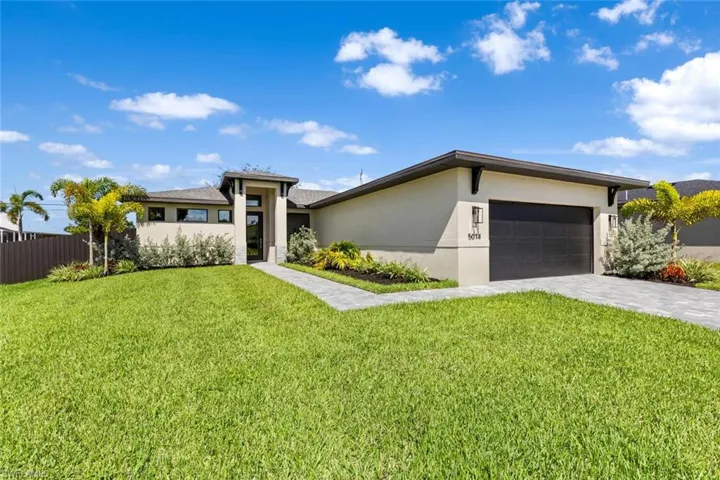 Brand new construction, meticulously landscaped