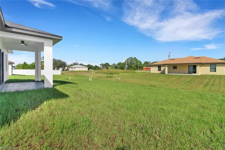 View of yard with a patio