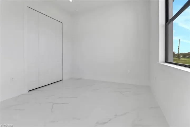 Unfurnished bedroom featuring a closet