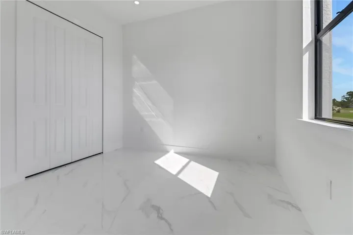 Unfurnished bedroom with a closet