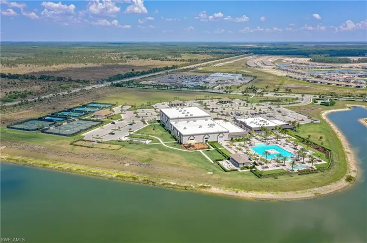 Aerial view of a large body of water and a pool area