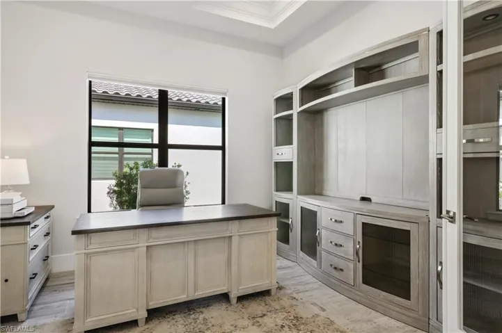 Unfurnished office with ornamental molding