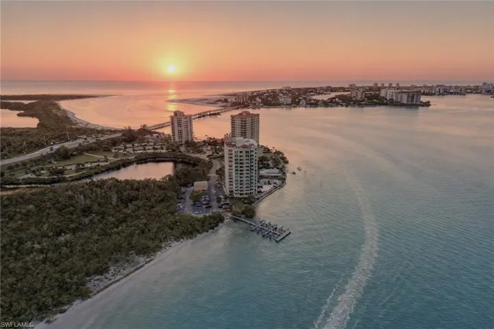 Aerial view at dusk of a water view and a view of city