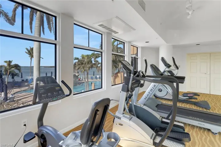 Exercise area with a water view
